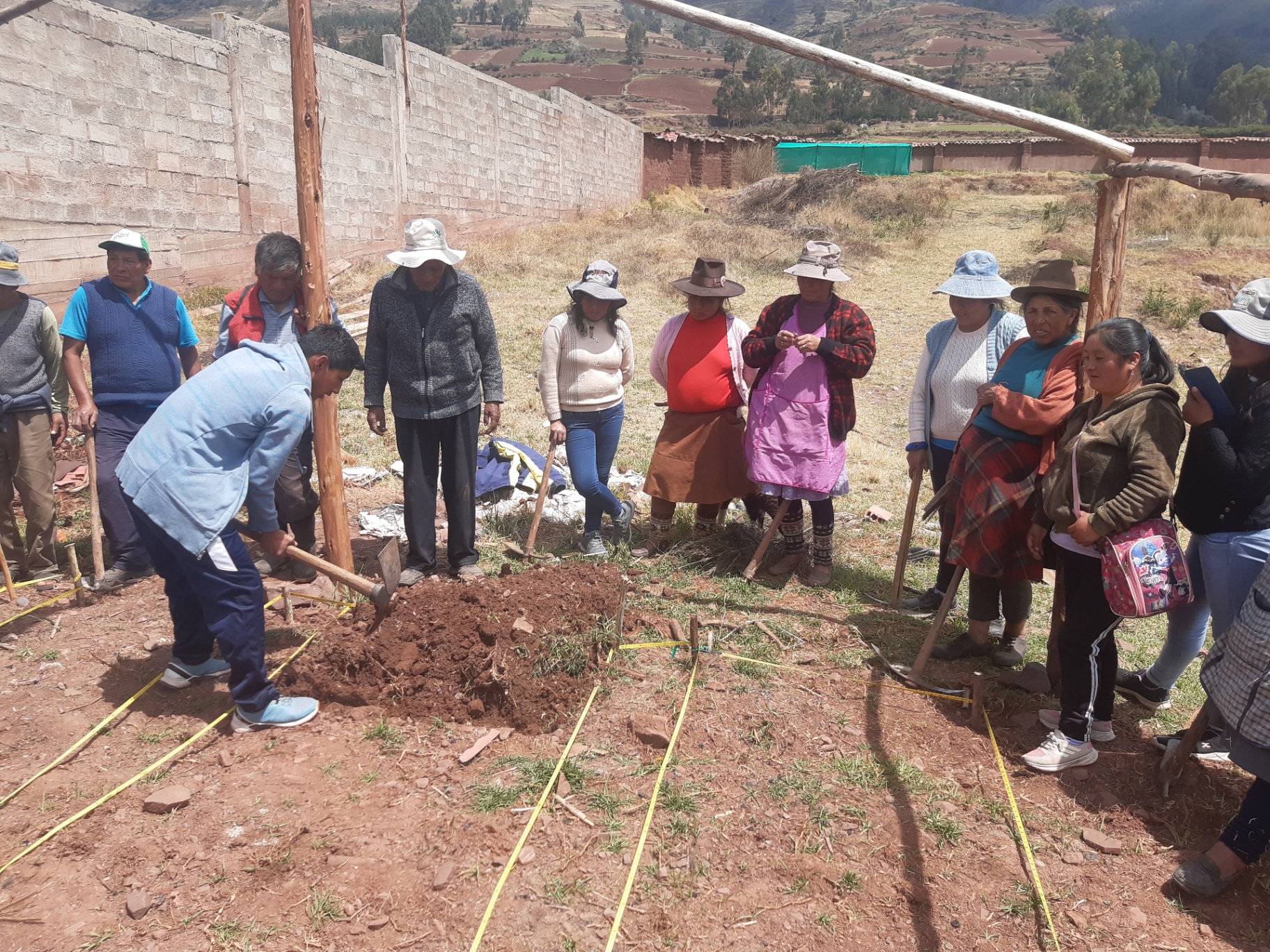 Community members building nursery infrastructure for young seedlings